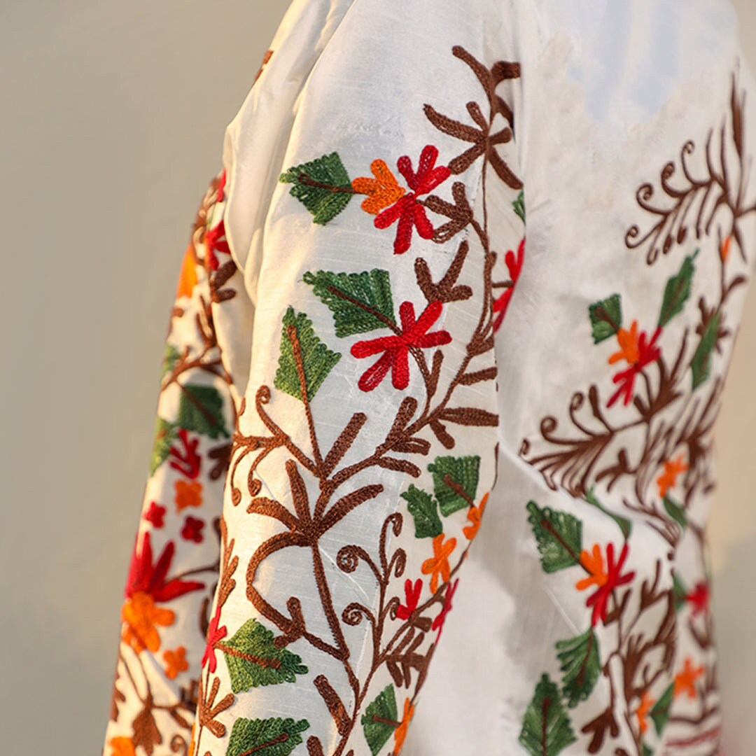 Raw Silk White coat with multi-colored Aari Kashmiri embroidery; Front open jacket; Detailed threadwork over high quality Kashmiri raw silk;