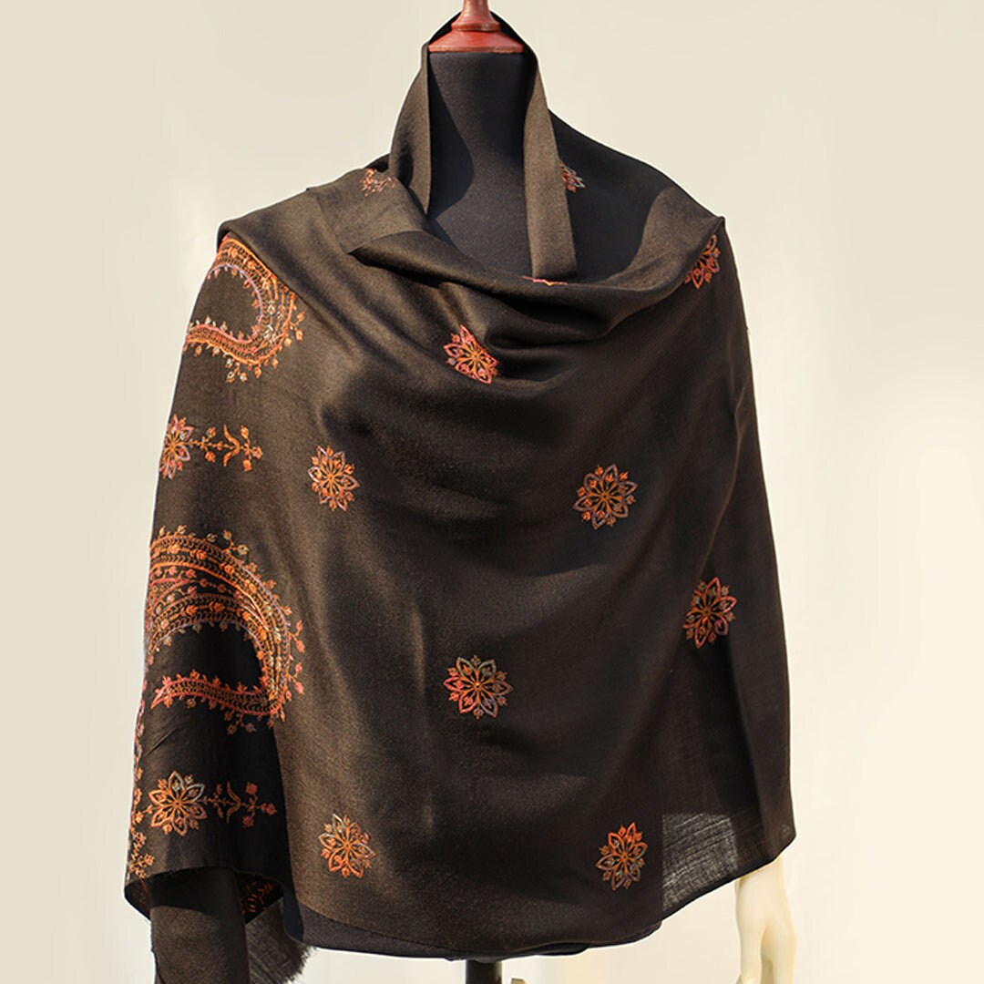 Black hand embroidered Kashmiri Pashmina wool shawl; Detailed subtle pink-rust-orange threadwork on high quality Cashmere wool; Full length