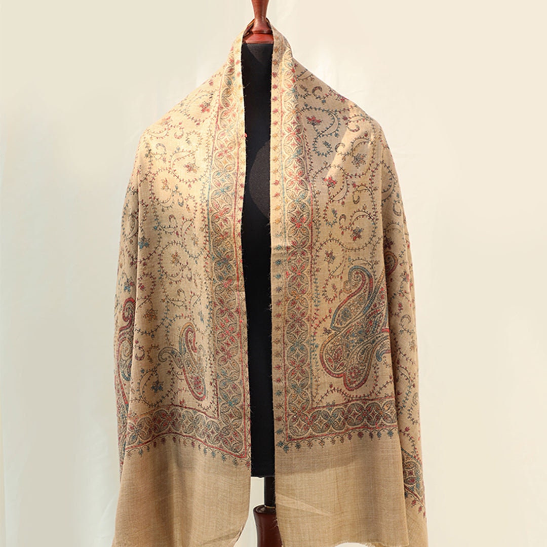 Beige base pashmina shawl with paisley pattern intricate hand embroidery in subtle bold yet light colors; Pashmina shawl from Kashmir