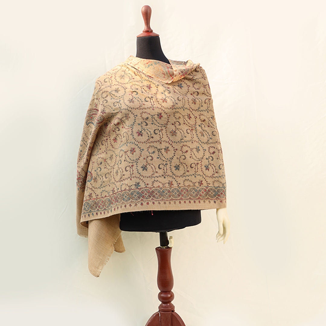 Beige base pashmina shawl with paisley pattern intricate hand embroidery in subtle bold yet light colors; Pashmina shawl from Kashmir