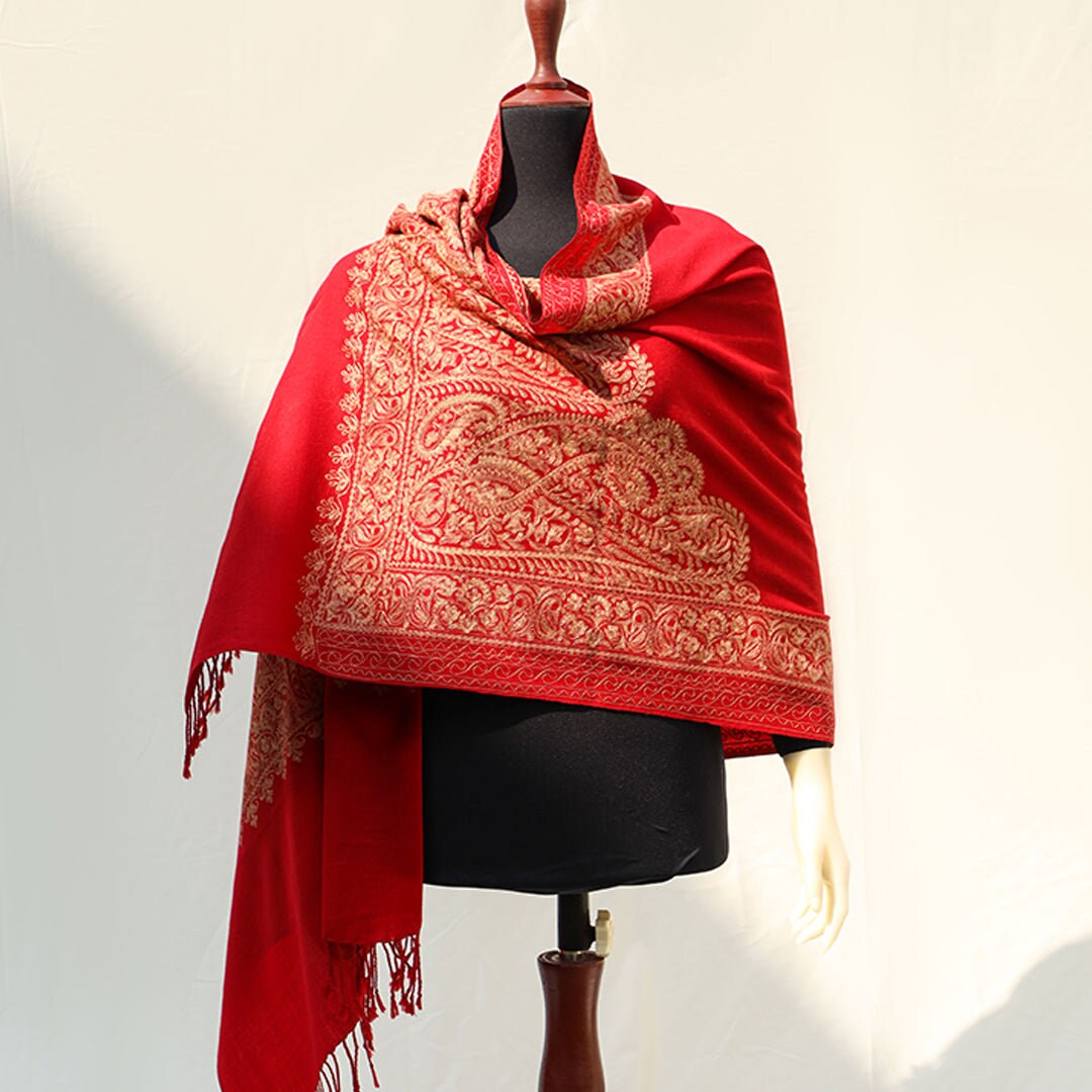 Bright red pashmina shawl with paisley embroidery in golden; Intricate embroidery all across the shawl; From Kashmir