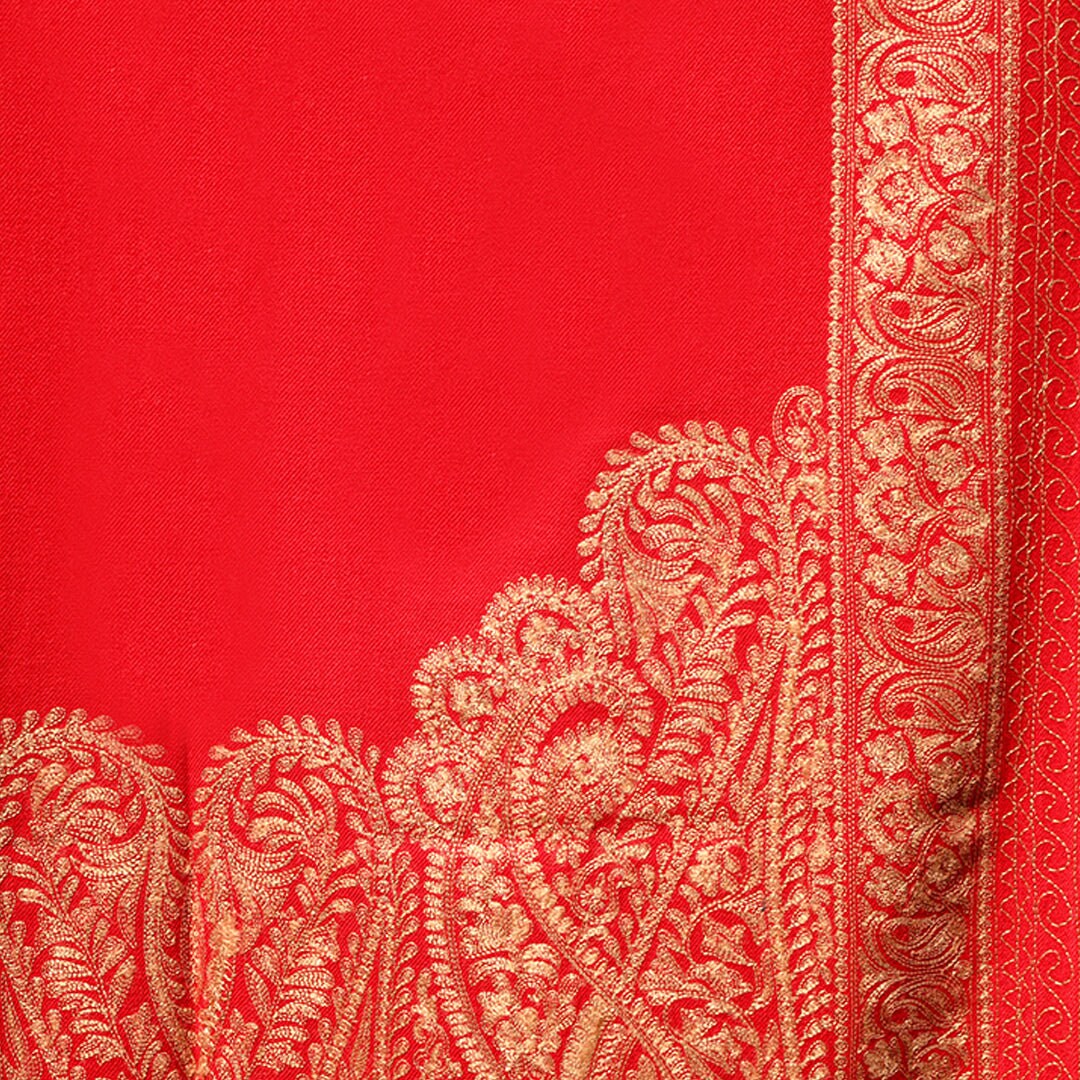 Bright red pashmina shawl with paisley embroidery in golden; Intricate embroidery all across the shawl; From Kashmir