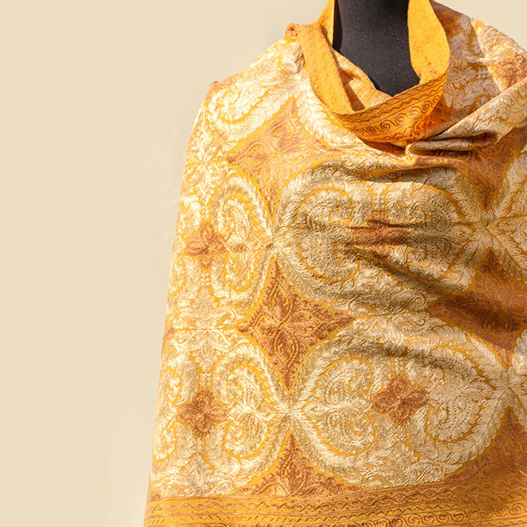 Light Mustard pashmina wool shawl with beige patterned embroidery all across; Intricate machine-work; pure wool pashmina from Kashmir