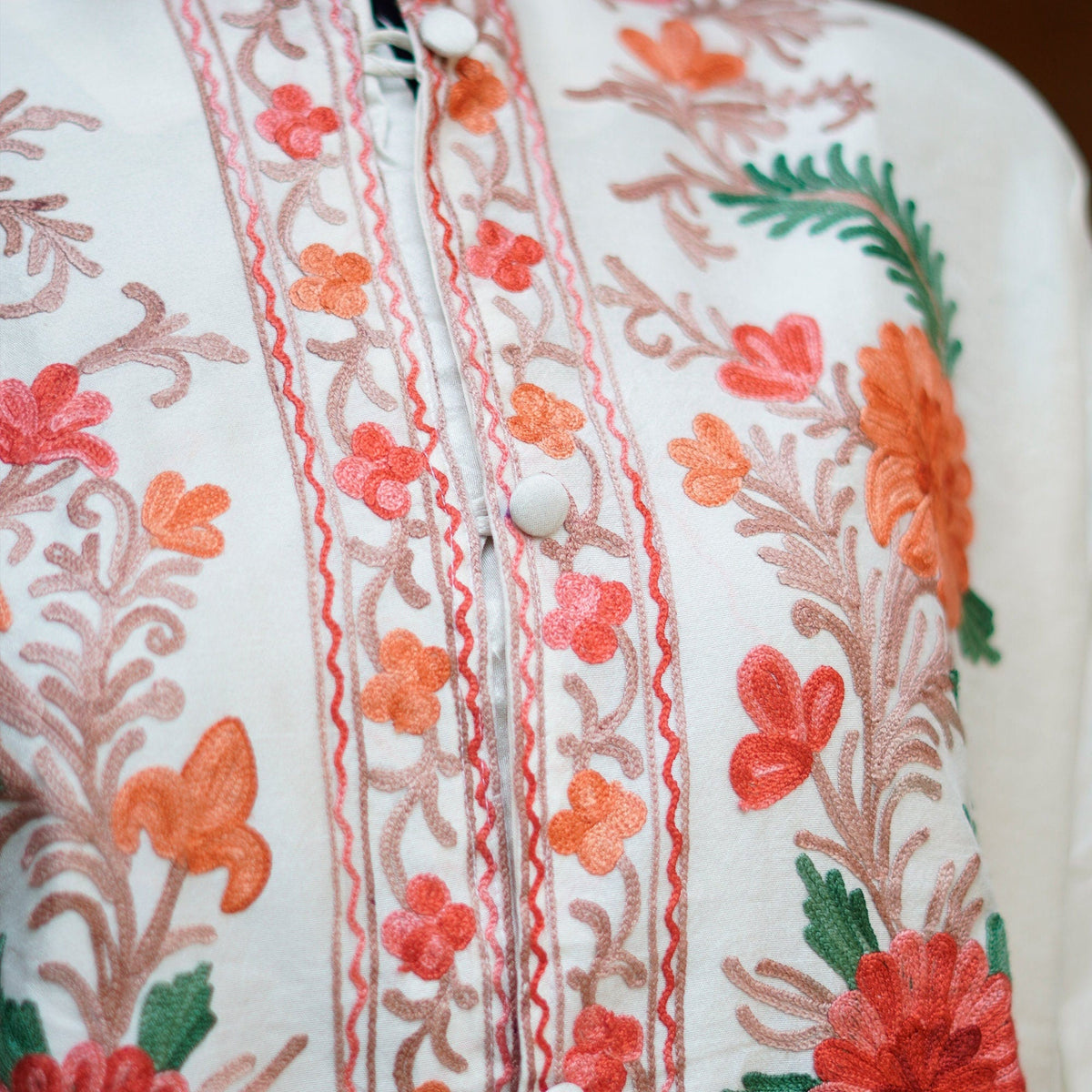 Pure white raw silk embroidered coat; Aari patterns intricate embroidery over high quality silk; Intricate threadwork