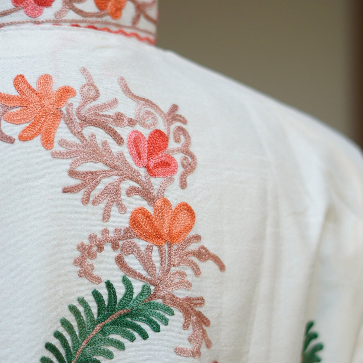 Pure white raw silk embroidered coat; Aari patterns intricate embroidery over high quality silk; Intricate threadwork