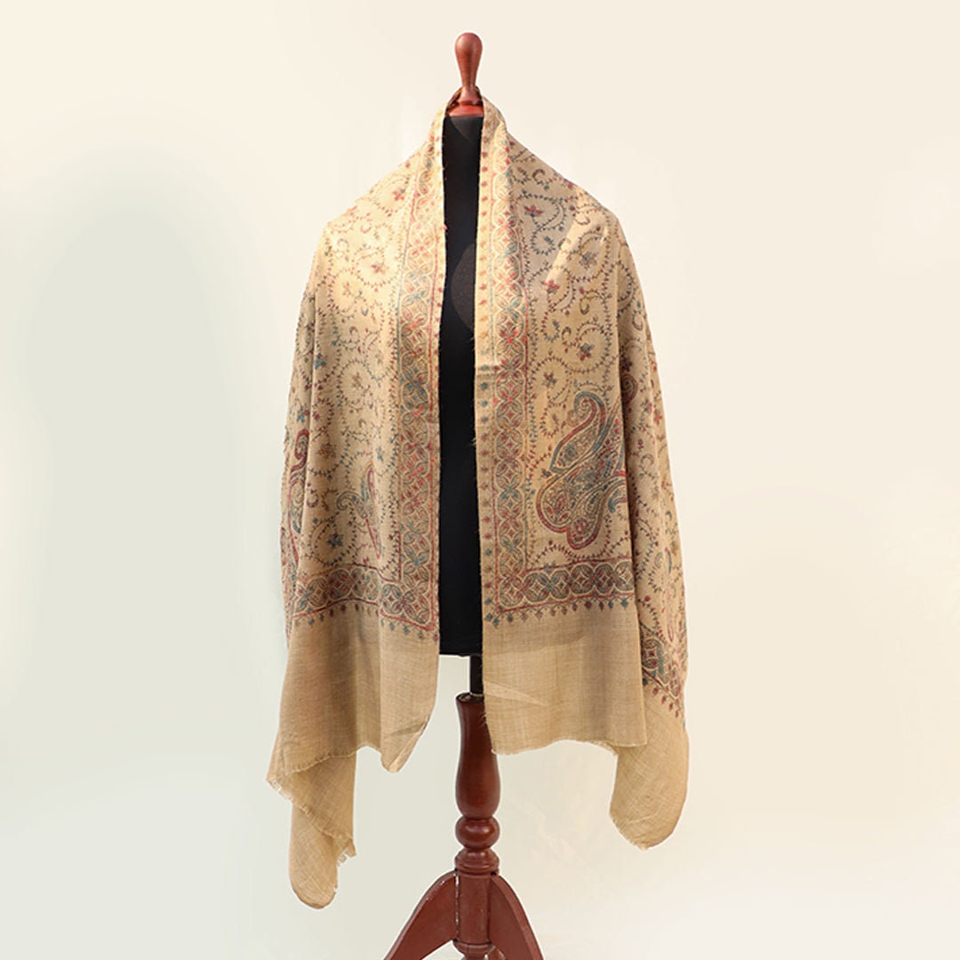 Beige base pashmina shawl with paisley pattern intricate hand embroidery in subtle bold yet light colors; Pashmina shawl from Kashmir