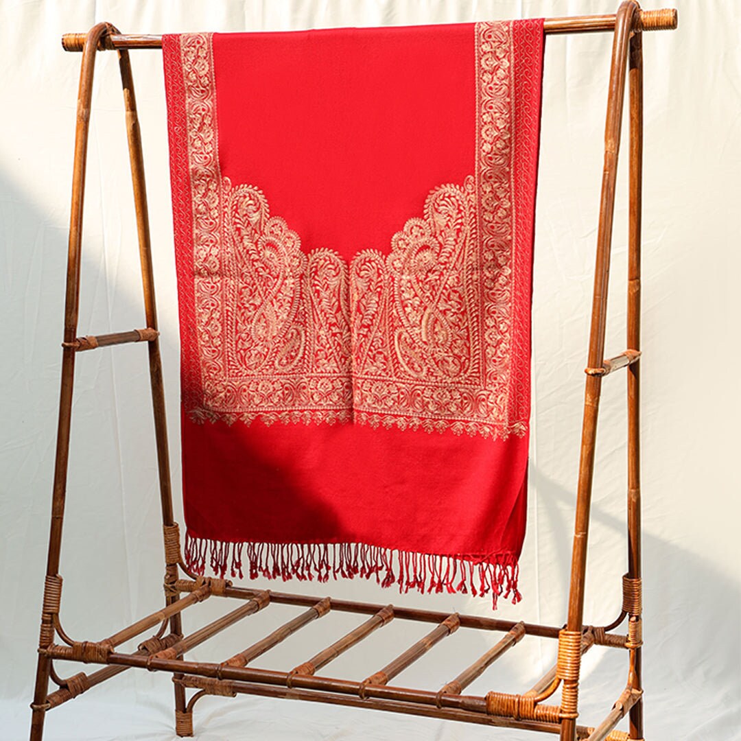 Bright red pashmina shawl with paisley embroidery in golden; Intricate embroidery all across the shawl; From Kashmir