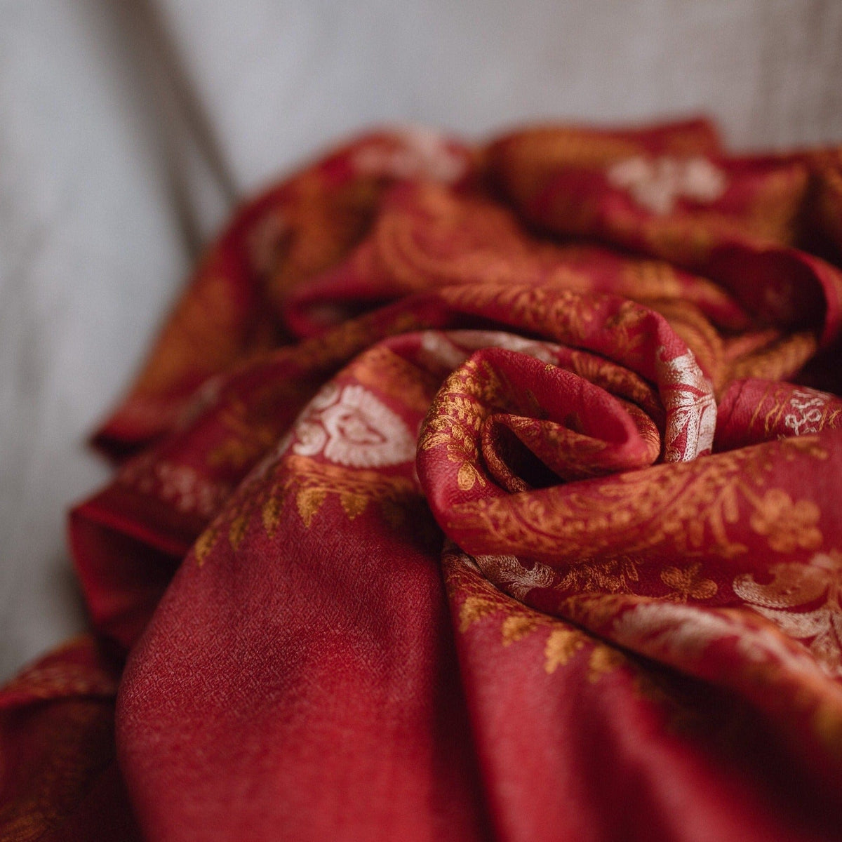 Maroon embroidered Kashmiri Pashmina wool shawl; Detailed mustard and bronze threadwork on high quality Cashmere wool; Full length shawl