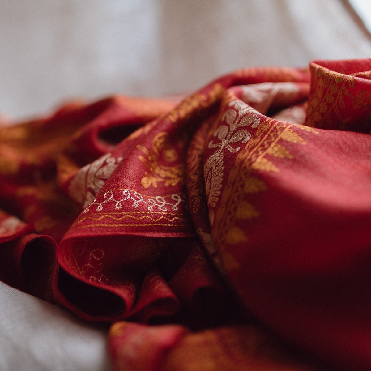 Maroon embroidered Kashmiri Pashmina wool shawl; Detailed mustard and bronze threadwork on high quality Cashmere wool; Full length shawl