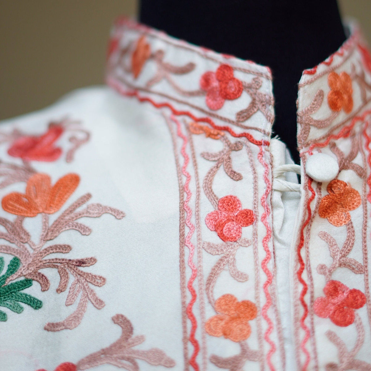 Pure white raw silk embroidered coat; Aari patterns intricate embroidery over high quality silk; Intricate threadwork