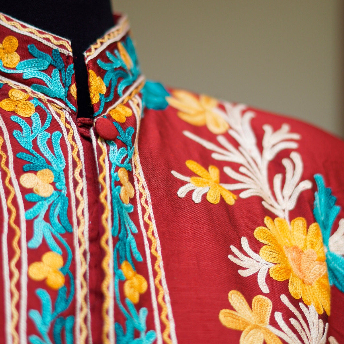 Deep Red long length raw silk embroidered coat; Intricate threadwork on high quality raw silk; Shiny finish high quality silk