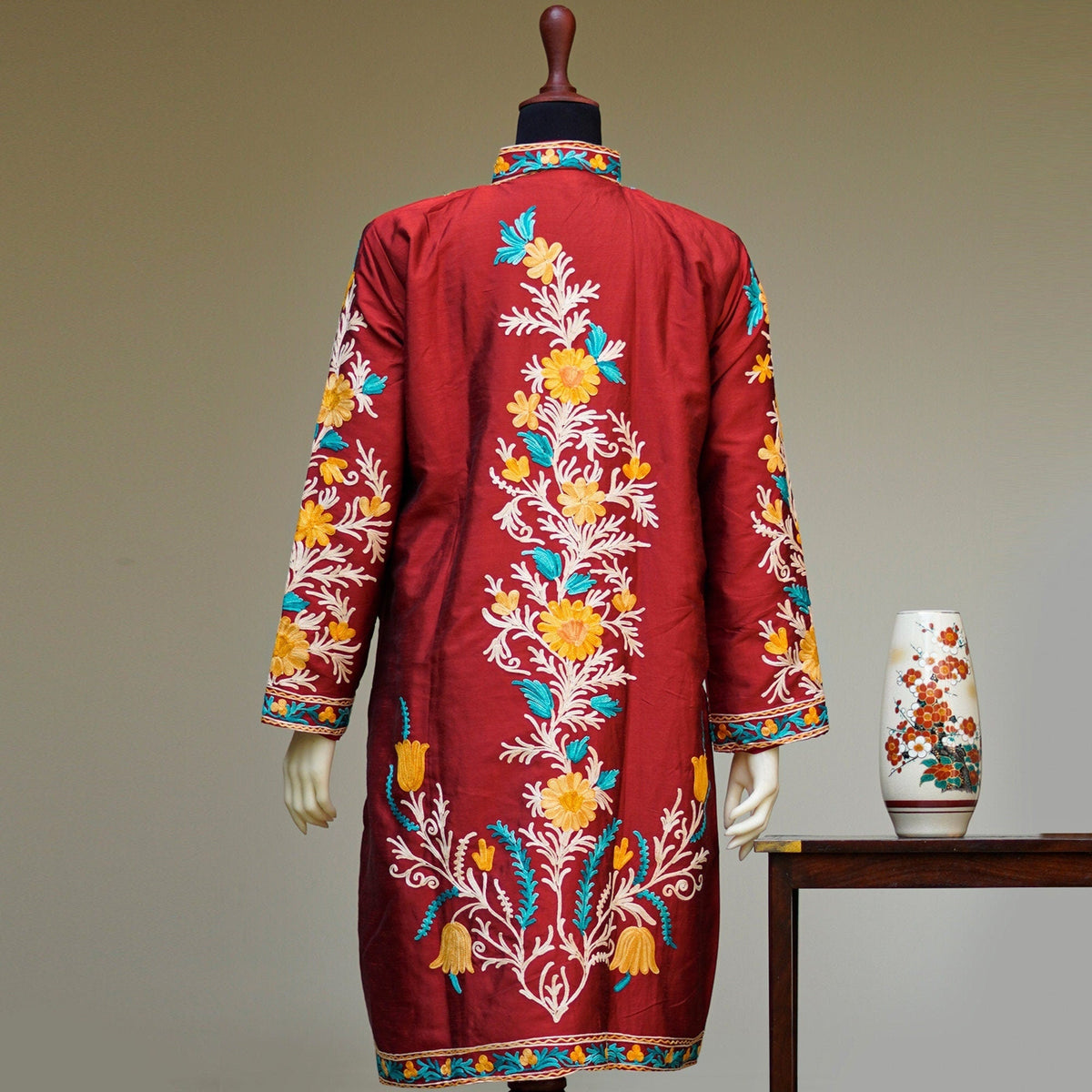 Deep Red long length raw silk embroidered coat; Intricate threadwork on high quality raw silk; Shiny finish high quality silk