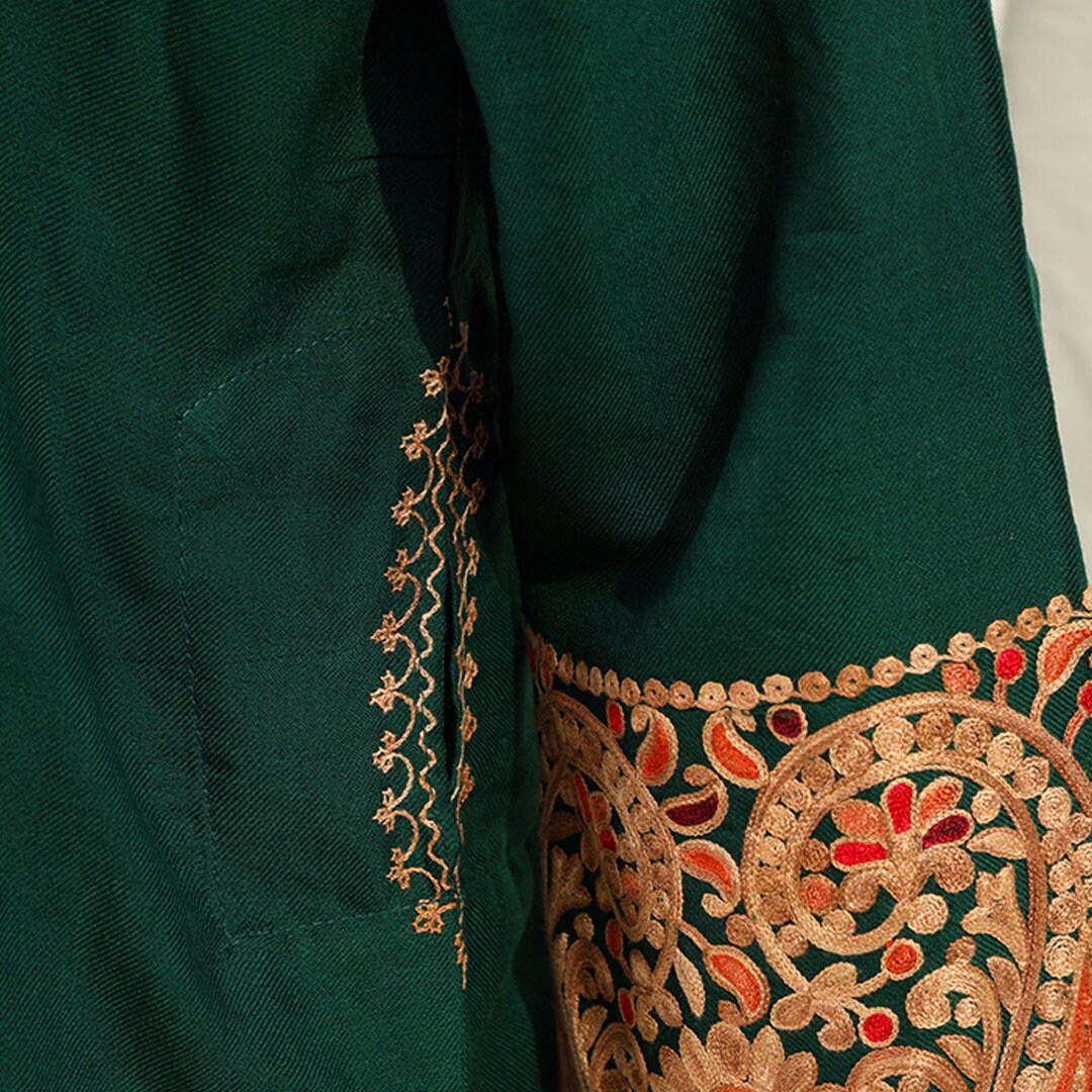 Dark Green pure wool loose fit kurta with pockets for women with paisley embroidered patterns on border for all occasions in pashmina wool